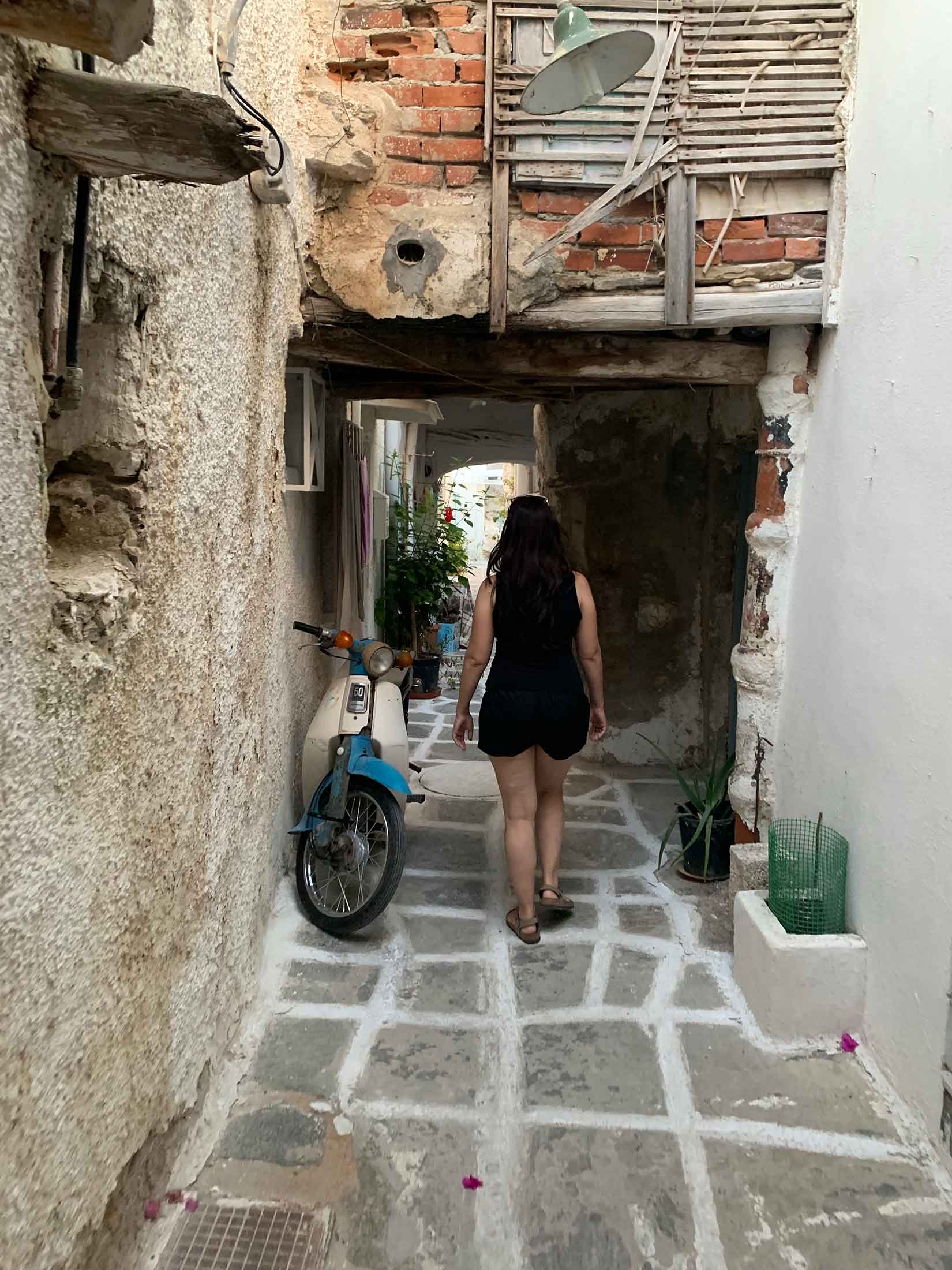 Bene walking in the narrow streets of Parikia, Paros island