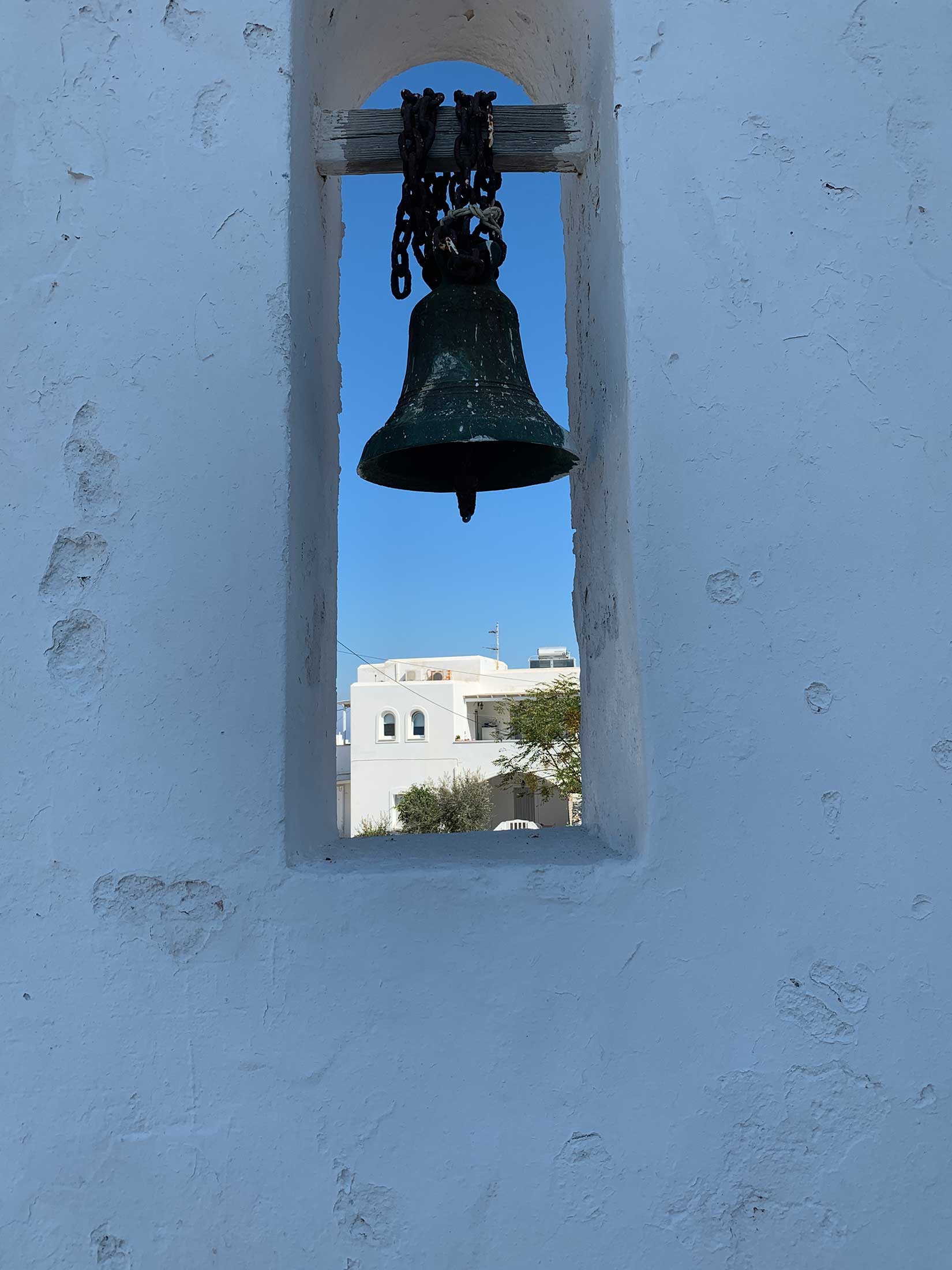 bell of Agio Anargyroi church Naousa, Paros island, Greece